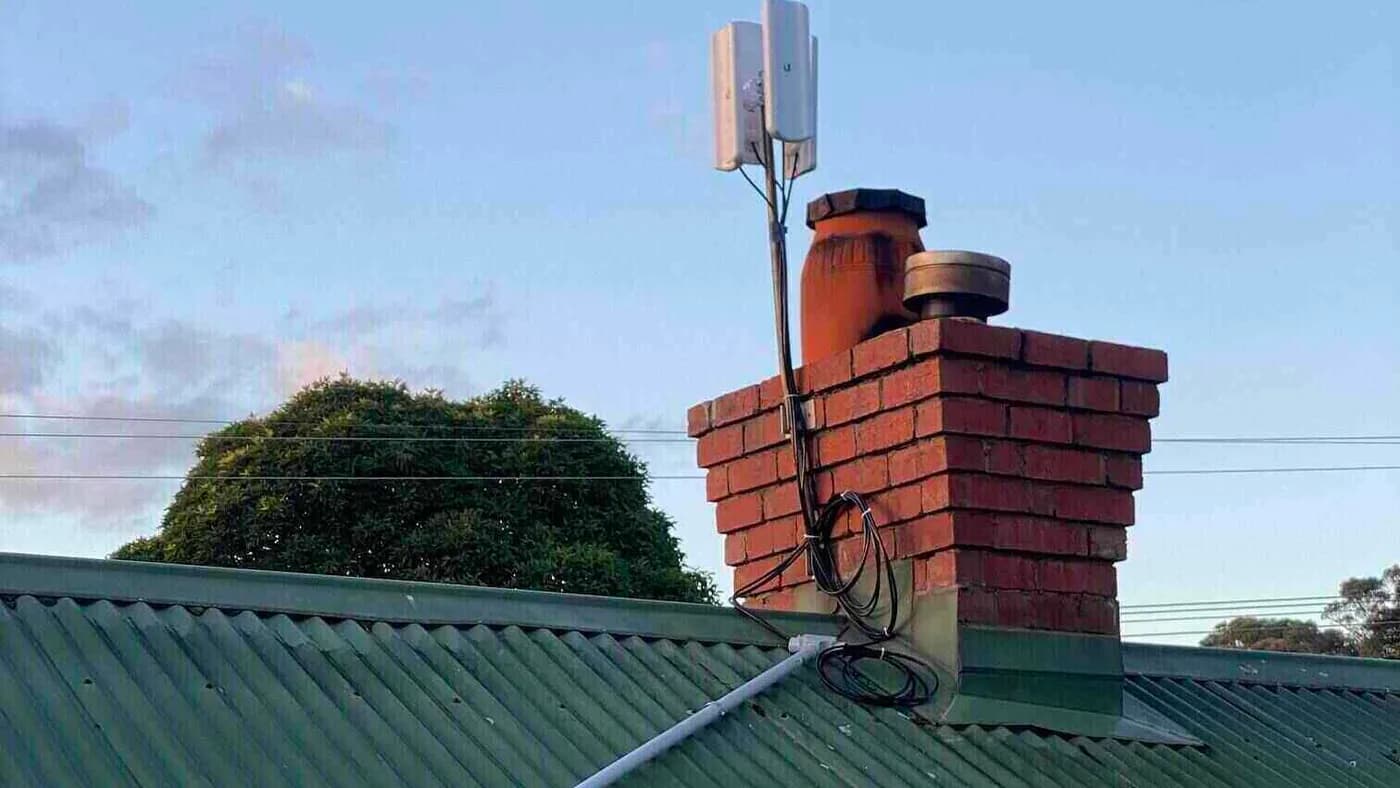 Fixed wireless antennas mounted on a Harkaway rooftop chimney
